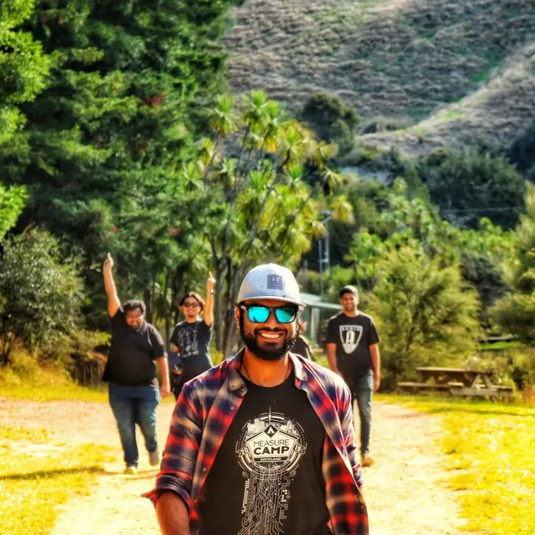 Prasanth Sasikumar walking towards the camera at MeasureCamp Auckland
