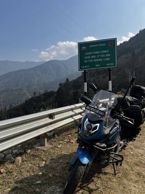A Border Roads Organisation marker in the hills.