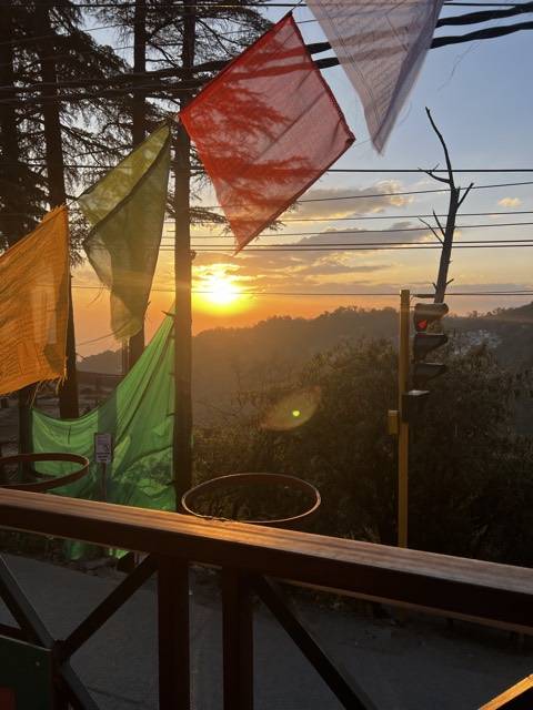Sunset through prayer flags at Dharamshala.