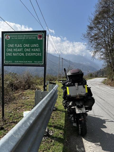 One flag, one land, one heart, one nation. A roadside sign on the climb north.